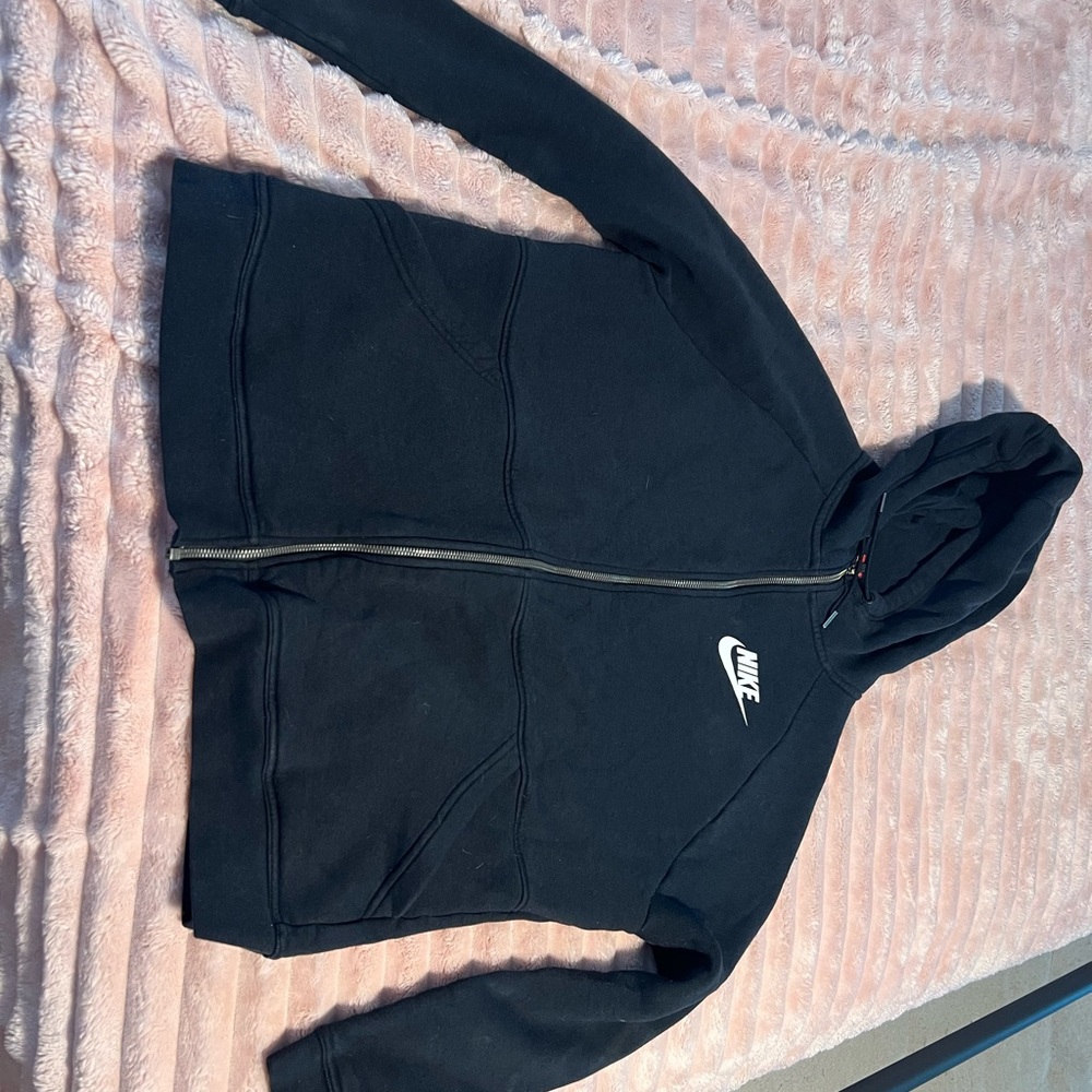 Women’s black Nike tech jacket